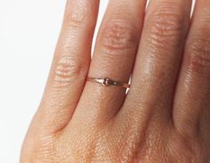 The cutest ring for any finger. I forge and hammer the metal to a tiny rose gold filled circle. Choose from sizes 3-10 and leave message in comment box at checkout. Try stacking these with the other rings. View the rest of the ring collection below: http://www.etsy.com/shop/BellatrinaJewelry?section_id=11006644 ** Follow us for updates, contests, and promos. :) www.facebook.com/BellatrinaJewels www.twitter.com/BellatrinaJewel Rose Gold Promise Midi Rings With Round Band, Simple Tiny Rose Gold Midi Rings, Rose Gold Midi Rings With Simple Design For Promise, Promise Rose Gold Midi Rings With Simple Design, Tiny Rose Gold Stackable Rings, Rose Gold Midi Rings For Promise, Adjustable Tiny Rose Gold Rings, Stacking Rings Wedding, Gold Ring Stacking