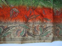 This is a beautiful Vintage Hand Embroidered Silk Saree. The colors are Green, Orange, Beige. Botanical, Floral Pattern Sari. Boho, Bohemian Party Wear, Wedding Sari. The Saree is 6 Meters Long. I have training in sewing and to me it looks like this whole 6 meters long fabric has been hand embroidered. That is very amazing. I can not start understanding how many hours it took to make. This item can be used as traditional a Sari or for home decor and sewing and craft projects. In my opinion it wo Bohemian Embroidered Green Dupatta, Bohemian Multicolor Saree For Wedding, Semi-stitched Bohemian Embroidered Fabric In Art Silk, Bohemian Art Silk Blouse Piece With Resham Embroidery, Bohemian Blouse With Resham Embroidery In Green, Bohemian Green Blouse Piece With Resham Embroidery, Bohemian Green Blouse With Resham Embroidery, Festive Multicolor Blouse Piece With Embroidered Border, Bohemian Traditional Wear With Multicolor Embroidery For Wedding