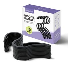 the black rubber band is next to it's box and its contents are shown