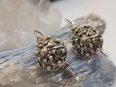 "These attractive earrings were handmade of Sterling Silver with stamp 925.  They were designed in collaboration with goldsmith house from Dalmatia, Croatia. They were created as a replica of old, traditional, filigree Dalmatian jewelry, characteristic for town of Šibenik and Dubrovnik. Beautiful  jewelry like this will be welcome in any wardrobe. It is interesting and special, but you can still combine it easily with different styles.  \"Botun\" is traditional jewellery that was declared as the Vintage Ceremonial Earrings With Intricate Design, Antique Filigree Earrings For Ceremonial Occasions, Ceremonial Vintage Earrings With Intricate Design, Hallmarked Ceremonial Drop Earrings, Antique Round Filigree Earrings, Antique Filigree Earrings, Hallmarked Drop Earrings For Ceremonial Occasions, Hallmarked Drop Earrings For Ceremonial Events, Ceremonial Hallmarked Drop Earrings