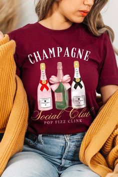 Champagne Social Club Graphic T Shirts.Unisex Crew Neck Short Sleeve Tees.Crafted from premium materials, tailored to your lifestyle, ensuring a comfortable fit for any occasion.Family Group Uniforms Birthday Party Gift Concert Festival Events.High Quality Direct To Film Printed Graphic Design.100%COTTON,HEATHER(52%COTTON,48%POLY),ATH.HEATHER,BLACK HEATHER(90%COTTON,10%POLY)NICARAGUAMade In: Nicaragua Trendy Red T-shirt For Party, Christmas Party T-shirt With Graphic Print, Holiday Party T-shirt With Short Sleeves, Holiday Party T-shirt With Crew Neck, Fall Party Tops With Letter Print, Fall Letter Print Party Tops, Letter Print Tops For Fall Parties, Red Short Sleeve T-shirt For Party, Fall Party Short Sleeve T-shirt