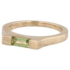 Gemstone Information: - Natural Peridot - Carats - 0.34ct Cut - Rectangle Color - Light Green Metal: 18k Yellow Gold Weight: 4.9 Grams Stamps: 750 Asprey Aldn Made in Italy 750 Face Height: 3 mm Rise Above Finger: 5 mm Band / Shank Width: 2 mm This ring is a size 7. Please contact us for sizing options. JBO Green Metal, Green Peridot, Solitaire Ring, Color Light, Light Green, Light Colors, Jewelry Rings, Size 7, Yellow Gold