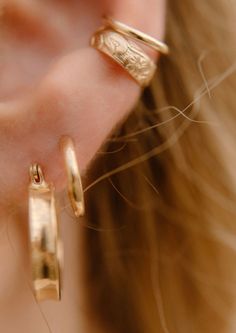 Get the look of a cartilage hoop, no piercing required. These ear cuffs are designed with the perfect amount of thickness and comfort so you can wear them every day - quite literally you never have to take them off. They can be worn in the shower + while you sleep. Simply slide onto the conch part of your ear and go. Wear one for a minimal look or grab a pair for stacking. Adjustable Single Ear Cuff For Everyday Wear, Trendy Hypoallergenic Ear Cuff For Everyday Wear, Trendy Internally Threaded Hoop Earrings For Everyday, Trendy Everyday Internally Threaded Hoop Earrings, Adjustable Hypoallergenic Ear Cuff For Everyday Wear, Hypoallergenic Adjustable Ear Cuff For Everyday, Adjustable Tarnish Resistant Piercings For Everyday, Trendy Hypoallergenic Hoop Ear Cuff, Adjustable Tarnish Resistant Ear Cuff For Everyday