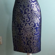 Sunny Leigh- This Elegant Skirt Is Sure To Bring Romance To Your Look When You Step Out For That Special Occasion, Back Zipper Closure, Back Kick Pleat, Fully Lined, Waist; 18” Flat, Hips; 22” Flat, Waist/Hem; 24”, 85% Polyester, 15% Metallic, 100% Polyester Lining, Size: 12. Silver Metallic Skirt, Metallic Skirt, Kick Pleat, Elegant Skirt, Blue And Silver, Sunnies, Metallic Silver, Royal Blue, Special Occasion