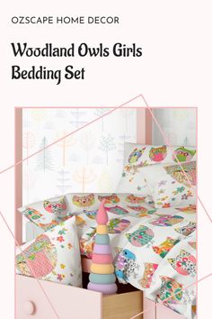 the woodland owls girls bedding set is shown in pink and white with geometric shapes