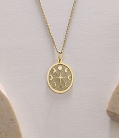 Gold Moon Pendant - Moon Phases Gold Necklace ● Material of pendant: Solid Gold 14k ( REAL GOLD ) ● Metal Stamp: 14k ( REAL GOLD ) ● The pendant is available in 5 sizes: - 12x17 mm / 0,47 x 0,66 inches - 13x18 mm / 0,51 x 0,70 inches  In the photos - 14x19 mm / 0,55 x 0,74 inches  - 16x21 mm / 0,62 x 0,82 inches  - 18x24 mm / 0,70 x 0,94 inches ( In the photos the size is 13x18 mm / 0,51 x 0,70 inches ) ( Jump Ring inner diameter: 4 mm ) ● Material of chain: Solid gold 14k ( REAL GOLD ) It is thin and dainty and it is available in 4 sizes: - 40 cm / 15,75 inches ( Length ) - 45 cm / 17,72 inches ( Length ) In the photos - 50 cm / 19,68 inches ( Length ) - 55 cm / 21,65 inches ( Length ) ● Backside engraving is FREE ( Please use the personalization box for that.) ● If you want larger size, Gold Moon-shaped Engraved Necklace, Celestial Oval Moon Phase Jewelry, Moon Phase Necklace, Spiritual Crescent Moon Phase Charm Necklace, Celestial Yellow Gold Charm Necklaces With Moon Phase, Gold Moon Charm Jewelry, Gold Crescent Spiritual Necklace, Gold Crescent Celestial Necklace, Gold Moon-shaped Celestial Jewelry