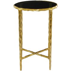 a black and gold side table with an oval glass tabletop on the top,