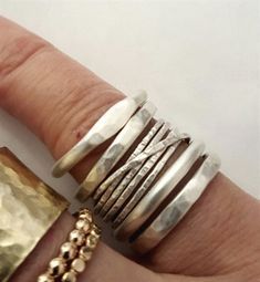 Modern Stackable Wide Band Jewelry, Modern Stacked Ring Jewelry, Modern Stacked Rings For Everyday, Modern Stacked Rings For Everyday Wear, Modern Handmade Stackable Rings For Anniversary, Modern Hand Forged Silver Stackable Rings, Modern Stacked Jewelry, Modern Hammered Stackable Rings For Anniversary, Modern Hammered Ring Jewelry