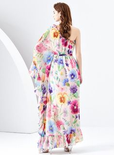 Overflowing with vibrant colors and whimsical charm, this one-shoulder maxi dress is a walking canvas of floral exuberance. It’s a garment that embodies the joy and freedom of spring, with its flowy fabric cascading gracefully to create a dreamlike silhouette. The dress’s design features a stunning spectrum of blooming flowers, each petal painted with the promise of new beginnings. An asymmetrical neckline bares the shoulder in a tasteful display of elegance, while the ruffled overlay adds a playful touch of femininity. Perfect for outdoor weddings or garden parties, this dress ensures you’ll float through events with the effortless grace of a petal on the breeze. It is a celebration of style, comfort, and the natural beauty that inspires it all, making it a must-have for the season. Fabri Garden Of Flowers, Flowy Fabric, Outdoor Weddings, Asymmetrical Neckline, Garden Parties, S Design, The Promise, Blooming Flowers, Printed Dress