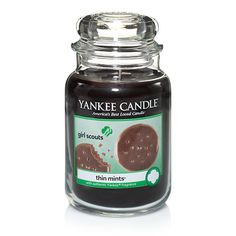 a glass jar filled with chocolate cake