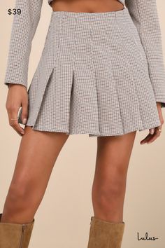 Curate a chic vibe wherever you go in the Lulus Convincingly Poised Brown Plaid Pleated Mini Skirt! Lightweight woven fabric boasts a plaid houndstooth pattern as it shapes this cute skirt that has a high waist and a flaring, pleated design. Mini hem completes the look. Hidden zipper/clasp at side. Pair with the matching skirt for a complete look! Fit: This garment fits true to size. Length: Mid-thigh. Size medium measures 16" from waist to hem. Waist: Fitted - very fitted at natural waist. Hip: Plaid Pleated Mini Skirt, Cute Skirt, Brown Plaid, Houndstooth Pattern, Cute Skirts, Pleated Mini Skirt, Bottom Clothes, Full Skirt, Hidden Zipper