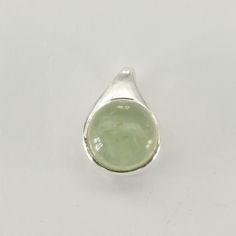 This is a beautiful Prehnite Pendant in 925 Sterling Silver. The pendant is made out of Sterling Silver with no nickel so there should be no allergic reaction and nothing will turn green. The silver is not only silver plated or steel but solid 925 Sterling Silver. We usually ship the same day in a nice gift box and we offer returns. Please note: Our jewelry is photographed close up to show detail and may appear larger than they are. We are happy to help with any questions. Hypoallergenic Green Sterling Silver Jewelry, Green Teardrop Polished Jewelry, Green Sterling Silver Drop Jewelry, Green Drop Sterling Silver Jewelry, Green Sterling Silver Jewelry With Polished Finish, Green Sterling Silver Gemstones With Polished Finish, Green Polished Sterling Silver Gemstones, Green Sterling Silver Teardrop Pendant Jewelry, Nickel-free Silver Peridot Jewelry