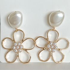 Brand New Earrings Color: Gold 2 Inches Long Limited Stock! Bundle 2/$25 Or 3/$35! This Listing Is Selling 1 Pair Of Earrings For $20 The Bundle Deal (2/$25 Or 3/$35) Applies To Bundles Of 2 Or More Jewelry Items If Any Clarification Is Needed, Kindly Leave Your Questions Below Flower Shaped Pearl Earrings For Spring, Floral Pearl Earrings For Spring, Spring Flower Shaped Pearl Earrings, Trendy Flower-shaped Earrings For Wedding, Trendy Flower Earrings For Wedding, Spring Flower Pearl Earrings, Elegant White Pearl Earrings For Spring, Chic White Flower Earrings For Spring, Spring Pearl Drop Gold Earrings