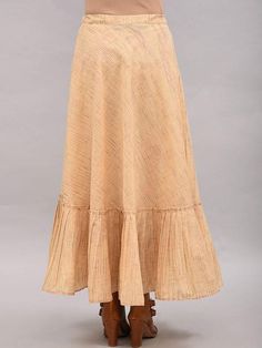 A full length beige tiered umbrella skirt with draw string at waist Ready garment measurements (in Inches): Free size: Length: 37", Waist - 39" Fabric: Cotton Dobby Color: Beige Fit: Model height is 5'7" Model is wearing a size S Loose and comfortable fit. Instructions: Hand wash separately in cold water This product will be shipped within 20-25 days of order placed. Relaxed Beige Tiered Maxi Skirt, Beige Relaxed Tiered Maxi Skirt, Beige Tiered Flowy Maxi Skirt, Beige Flowy Tiered Maxi Skirt, Cream Pleated Tiered Skirt, Bohemian Cream Ruffled Skirt Bottoms, Cotton Maxi Skirt With Ruffle Hem, Beige Tiered Lined Maxi Skirt, Cream Ruffled Long Skirt