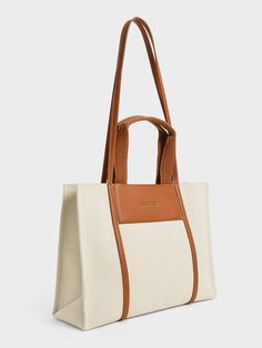 Cognac Shalia Large Double Handle Tote Bag - CHARLES & KEITH US Versatile Canvas Satchel For Errands, Casual Cognac Shoulder Bag With Large Capacity, Casual Large Capacity Cognac Bag, Large Capacity Casual Cognac Bag, Large Canvas Satchel For Errands, Classic Rectangular Canvas Bag For Errands, Versatile Beige Canvas Satchel, Canvas Satchel With Large Capacity For Errands, Large Capacity Canvas Satchel For Errands