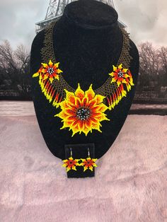 All our pieces are genuine and each chaquira is handcrafted by artisans from the most representative areas of huichol art. We only have one piece of each style, choose the option or style you like and only choose 1 in quantity, thank you. Handmade Bohemian Jewelry Sets For Gift, Yellow Beaded Flower Necklace As Gift, Yellow Beaded Flower Necklace For Gift, Yellow Beaded Flower Necklace Gift, Handmade Pendant Beads For Gifts, Handmade Pendant Costume Jewelry Sets, Handmade Yellow Beaded Necklaces As Gift, Handmade Yellow Beaded Necklaces For Gifts, Beaded Pendant Jewelry Sets For Gifts