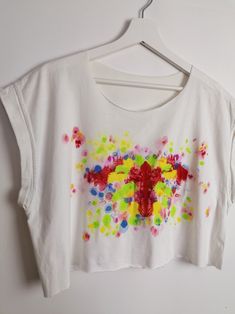 "One-of-a-kind reworked crop top, loose oversized fit, raw edges on neckline and bottom, rolled up sleeves. Item is reworked from an excellent quality cotton vintage oversized t-shirt, hand-painted by yours truly with water-based special textile colours. The print is inspired by the Rorschach's inkblot test, but less gloomy. The way the colours combine is totally arbitrary, no two designs will ever be the same. I see \"In Utero\". What do you see in this print? :) This crop top has already been Boxy Cropped Cotton Shirt For Spring, Boxy Cropped Cotton T-shirt For Summer, Oversized Cotton Cropped T-shirt For Summer, Oversized Cropped T-shirt For Summer, Cotton Crop Top With Screen Print And Relaxed Fit, Spring Cropped Tops With Screen Print, Cotton Crop Top With Screen Print, Relaxed Fit, Spring Cropped Top With Screen Print, Boxy Cotton Cropped T-shirt For Spring