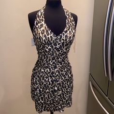 Charlotte Russe Cheetah Print Halter Dress Nwt Chic Fitted Tiger Print Dress, Chic Tiger Print Mini Dress For Party, Chic Tiger Print Party Dress, Chic Party Dress With Tiger Print, Fitted Sleeveless Mini Dress With Tiger Print, Fitted Sleeveless Tiger Print Mini Dress, Spring Party Mini Dress With Tiger Print, Fitted Tiger Print Dress For Night Out, Black Tiger Print Dress For Party