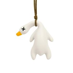 a white plastic toy with a cross on it's face and hands hanging from a cord