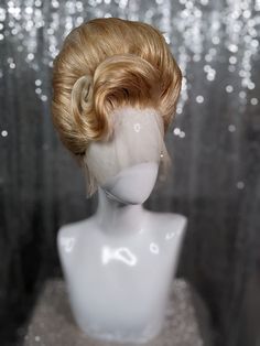 A fully styled synthetic lacefront wig. This style is an elegant 1960s beehive updo style with a front swoop. Colours pictured: Vanilla Caramel, Platinum Blonde Please note: all wigs are made to order, these wigs are for illustrative purposes only. Beehive Updo, Beehive Wig, Updo Wig, Vintage Wigs, Drag Queen Wigs, Historical Hairstyles, Lacefront Wig, Drag Wigs, High Fashion Hair