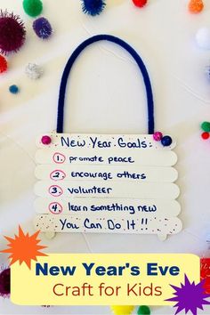 a new year's eve craft for kids with pom - poms around it