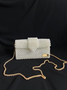 Bead bags are 100% handmade. Bead strap length can be changed upon request. It fits phone, card holder, lipstick, earphone case. It will come with a special pouch. * Dimensions - Width: 22 cm - Height: 13 cm - Depth: 6 cm - Strap Length: 110 cm * Materials - Luxury Plated Pearl - Gold Material * Shipping - Ships worldwide from İstanbul, Turkey. - Production time before shipment is 2-7 working days. - 2-5 business days is for USA shipment. ☆☆ Note: Strap size can be changed according or color of the pearl to your request. Please contact us for any changes you want to make to the product. ☆☆ It can be created to your requests bigger, smaller with the same style. For custom-making this bag, please leave us a message.  ♡ Thank you for shopping from my small business! ♡ AtelierofDream Beaded Rectangular Phone Bag For Parties, Rectangular Beaded Phone Bag For Parties, Party Beaded Rectangular Phone Bag, Elegant Square Phone Bag As Gift, Party Rectangular Beaded Phone Bag, White Rectangular Phone Bag For Party, Elegant White Square Phone Bag, Everyday Rectangular Beaded Clutch, Rectangular Bag With Beaded Chain For Gift