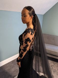 Bride is shown from the side with a black lace wedding gown with long sleeves and a long black wedding veil. Black Veil Wedding, Wedding Gown Lace Sleeves, Unique Wedding Gowns, Non Traditional Wedding