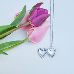 This beautiful, heart-shaped locket is crafted in Stainless Steel and plated in 18k Gold. The locket can hold a photograph and can be engraved on the back to showcase love for family and friends. Metal: 18K Gold plating over Stainless Steel Chain Length:16 Inches + 2 inches extension Nickel & Lead free & Hypoallergenic Complimentary Gift Box Included Heart Locket Necklace Silver, Heart Locket Necklace, Heart Locket, Beautiful Heart, Locket Necklace, Steel Chain, Stainless Steel Chain, Gold Plating, Chain Lengths