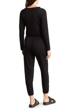 Go casual in this one-and-done jumpsuit fashioned with an elastic blouson waist and cinched elastic hems. Crewneck Long sleeves 90% modal, 10% spandex Hand wash, dry flat Made in the USA of imported fabric Model stats: 5'10" height, 32" bust, 25" waist, 36" hip. Model is wearing size Small. Long Sleeve Jumpsuit, Jumpsuit Fashion, Nordstrom Rack, Jumpsuit, Hand Wash, Nordstrom, Long Sleeves, Spandex, Couture