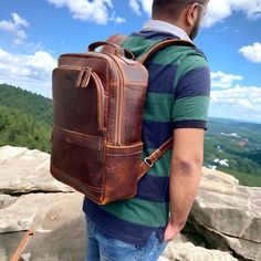 "Christmas Day Special offer Flat 70% Off With Free Shipping  ✍✍Free Personalization  Free Gift Wrapping Free Shipping 🔰 FEATURES: ◾ Unisex Backpack ◾ Made in Full-grain Leather, Excellent Quality ◾ Brown Vintage Color ◾ Padded pocket for laptop in the main compartment ◾ Antique Brass Hardware ◾ YKK Zippers ◾ 2 Pen Holder Slot ◾ Phone Holder and card Holder Slot ◾ Interior Zipper Pocket  ◾ Cotton Lining 🔦Material: Cowhide Genuine Leather 🔦Style: British Style, Gentry 🔦Capacity: Can hold a 14inch laptop, A4 book, folding umbrella, iPad, etc. 🔰🔰 Dimensions 🔰🔰 ◼ 16 Inches Height :- 16 Inches Length :- 12 Inches Width :-   5 Inches ◼ 18 Inches Height :- 18 Inches Length :- 13 Inches Width :-    6 Inches High Quality🤞 This handmade genuine leather bag is made from traditionally tanned Rectangular Leather Backpack For Back To School, Leather Softback Backpack For Back-to-school, Leather Rectangular Backpack For Back To School, Vintage Leather Backpack, Handmade Leather Backpack, Leather Backpack For Men, Timeless Bags, Brown Backpacks, Brown Leather Backpack