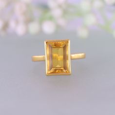 Emerald Cut Citrine ring, November Birthstone Jewelry, Statement Ring, Gold Promise Ring, Rectangle Ring, Engagement Ring Cocktail Gold Ring Ring Description: - Main Stone- Citrine Creation- Lab Created Stone size - 11x7MM Stone Color- Yellow Stone Shape - Emerald Cut Birthstone - November Check out my other items!   PAYMENTS   We accept PayPal, If we do not receive payments immediately we will hold the item only for one working day for your payments and we will be re-listing the item afterward. if there is difficulty in paying for the item/s you have bought immediately please contact us so we can hold your item. FEEDBACK Please contact us if you have any problem with the product before leaving negative feedback, opening a case, or a return request. we will try our very best to solve any p Gold Rectangular Birthstone Ring, Rectangular Gold Birthstone Ring, Yellow Citrine Topaz Ring Rectangular Shape, Rectangular Topaz Ring In Fine Jewelry Style, Rectangular Gold Birthstone Ring For Wedding, Yellow Rectangular Gemstone Rings, Yellow Rectangular Anniversary Ring, Classic Yellow Rectangular Rings, Formal Yellow Rectangular Rings