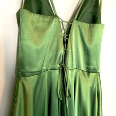 Only Worn Once! Never Been Altered. Gorgeous Green Color. Green Sleeveless Dress With Lace-up Back, Sleeveless Green Dress With Lace-up Back, Green Evening Dress For Spring Date Night, Green A-line Maxi Dress For Night Out, Green Evening Dress For Night Out In Spring, Party A-line Maxi Dress With Tie Back, Green Lace-up Back Evening Dress, Green Lace-up Back Dress For Evening, Green Tie-back Midi Dress For Night Out