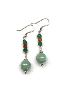 Green Jade Beads, Green Aventurine Beads, Jade Beads and 925 Sterling Silver Earrings.  A pair of dangling earrings with green jade beads, complemented by green aventurine beads and jade beads. Very beautiful and one of a kind!  - made with green jade beads, green aventurine beads and orange red jade beads, 925 sterling silver beads and 925 sterling silver wires and hooks - approximately 50 mm / 2 inches in length of the earrings - approximately 10 mm / 0.39 inches diameter of the green jade bea Jade Jewellery, Red Jade, Jade Earrings, Earrings Green, Red Colour, Jade Jewelry, Dangling Earrings, Jade Beads, Green Jade