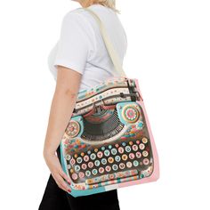 Get ready to turn heads with our Retro Typewriter Kitschy Quirky Funky Fun Tote Bag! Designed in a playful pink and aqua mod style, this bag is the perfect accessory for those who don't take themselves too seriously. Show off your unique sense of style with this fun and functional tote! Available in 3 sizes to add both functionality and style, these custom-printed tote bags come with multiple handle colors to match your designs.  Made with spun polyester, these bags feature double-stitched seams Retro Pink Shoulder Bag For Daily Use, Trendy Pastel Bags For Everyday Use, Pink Retro Shoulder Bag, Retro Pink Shoulder Bag As Gift, Pink Retro Shoulder Bag As Gift, Vintage Pink School Bag, Pink Vintage School Bag, Retro Pink Satchel Shoulder Bag, Playful Pink Bag For Everyday Use