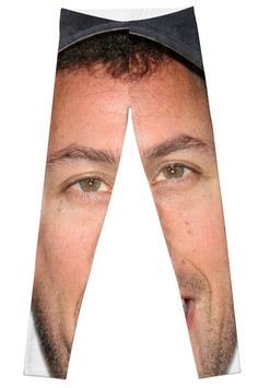 a man's face is shown through the bottom half of his leggings