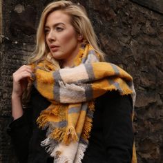 A warm winter scarf designed in Scotland and inspired by our heritage tartans. Ideal for wrapping up against the cold, this is a blanket scarf women will wear again and again. Perfect as a pashmina shawl, winter wrap or oversized blanket scarf this super soft tartan scarf is a classic winter accessory.   Easily personalise by adding charms to your scarf and give a personalised gift for her your loved one will cherish.  A classic plaid pattern scarf, this oversized shawl can be easily personalise Plaid Scarves For Cold Weather In Winter, Casual Yellow Scarf For Winter, Casual Yellow Winter Scarf, Plaid Winter Scarves One Size, Winter Plaid Scarves One Size, Plaid Shawl Scarf For Fall, Fall Plaid Shawl Scarf, Yellow Winter Scarf, One Size, Yellow Winter Scarf One Size