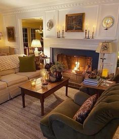 a living room filled with furniture and a fire place