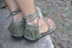 This listing is for a pair of suede green leather sandals. Play around with your summer style with these beautiful, very comfortable and light leather sandals. Featuring a leather fringe on the back and two leather straps to tie the sandals around your ankle. These sandals will make a perfect combination with the barefoot sandals sold in my shop :) (picture 4) https://www.etsy.com/listing/238996279/brown-and-green-brass-hamsa-hand?ref=listing-shop-header-0 If you are unsure of your size please f Green Leather Flip Flops With Round Toe, Green Suede Closed Toe Sandals, Green Bohemian Sandals With Round Toe, Green Suede Sandals With Round Toe, Green Leather Bohemian Sandals, Green Bohemian Closed Toe Sandals, Green Bohemian Leather Sandals, Bohemian Green Closed Toe Sandals, Green Bohemian Round Toe Sandals