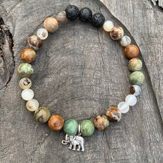 Stay Grounded While Abundance Flows To You! Brown For Grounding And Green For Abundance, Colors Of Earth And Nature. Moss Opal And Montana Agate. Elephant Charm Enhances Intention Representing Abundance...Luck. Lava Beads Act As Diffusers For Essential Oil Aromatherapy. Stretch Bracelets Approx 7.5”. Beading Bracelets, Clear Bracelet, Malachite Bracelet, Aromatherapy Bracelet, White Pearl Bracelet, Sparkle Bracelet, Lucky Elephant, Elephant Bracelet, Stay Grounded