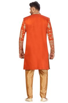 Product Features: Top Color: Rust Orange Bottom Color: Gold Work: Embroidery Top Fabric: Art Silk Bottom Fabric: Art Silk Pack Of: 1 Sherwani and Aligarh Pant Occasion: Partywear Disclaimer: There will be slight difference in digital to actual image Chanderi Sherwani With Zari Work For Festivals, Festival Sherwani With Zari Work In Chanderi, Long Embroidered Salwar Kameez For Diwali, Diwali Embroidered Long Salwar Kameez, Long Sets With Intricate Embroidery For Eid, Semi-stitched Chanderi Sherwani With Zari Work, Embroidered Churidar For Ceremonial Occasions, Embroidered Long Churidar For Festive Season, Bollywood Style Festive Chanderi Sherwani