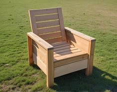 a wooden chair sitting on top of a lush green field