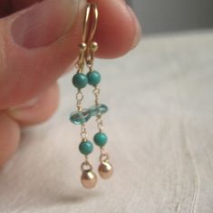 Long and lovely. Green turquoise and aqua apatite beads are linked together and punctuated by solid 14k pink gold drops. These hang 1 1/2". These earrings are made to order. Rose Gold Dangle Earrings, Turquoise Earrings Dangle, Gold Dangle Earrings, Gold Earrings Dangle, Etsy Earrings Dangle, Green Turquoise, Turquoise Earrings, Jewelry Making Beads, Pink Gold