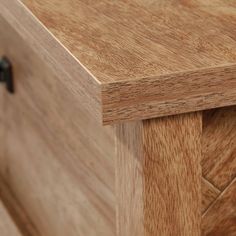 a close up view of a wooden dresser