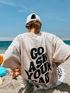 'GO ASK YOUR DAD' graphic on front & back - Ivory & Black Lettering, Baby Blue & White Lettering, Blue & White Lettering, Black & White Lettering Made with love from your local Mom & Dad!  100% cotton  washer & dryer friendly Hannah is wearing the oversized look with an XL!  Xo, Yourmomandad! Mama Graphic Tees, Oversized White T-shirt With Lettering, Beige Graphic Tee With Text Print, Oversized Graphic Tee With Lettering, Beige Letter Print Top For Streetwear, Beige Letter Print Relaxed Fit Tops, Oversized Beige T-shirt With Graphic Print, Beige Relaxed Fit Tops With Letter Print, Beige Graphic Tee With Letter Print