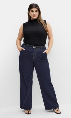 Both curve-loving and trendy, the Harley Kyla Wide Leg Jean is just begging to be worn. Made with stretch cotton blend fabrication and high denim fibre, you're sure to reach for this piece for years to come. Compete with a high rise style, fit and flatter your curves endlessly with these jeans. Key Features Include: - The perfect fit for an hourglass figure - Belt looped semi elasticated waistband - High rise - Side pockets - Single button and fly fastening - Inside leg seam detailing - High den Plus Size Straight Leg Jeans Outfits, Mid Size Jeans, Hourglass Outfits, High Rise Style, Denim Chic, Dark Denim Jeans, Plus Size Jeans, Clothing Styles, City Chic