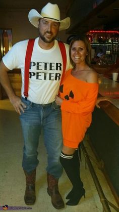 a man and woman are dressed up for halloween