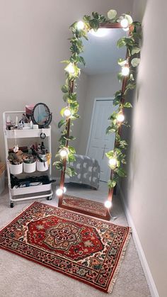 a mirror and rug in a room with plants on the floor next to each other