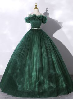 Radiate utter beauty in this exquisitely crafted Kemedress creation. Metallic lace appliques and tiny jewels are meticulously placed throughout the off the shoulder sweetheart neckline and corset styled bodice of this dark green ball gown. The sumptuous tulle skirt is dotted with metallic appliques and pleats, streaming into a train, and adorned with delicate crystal embellishments. Be the center of attention in this Kemedress masterpiece. Prom Dress Green, Tulle Neckline, Sweet 16 Dress, Off Shoulder Evening Dress, Green Evening Dress, Green Tulle, Tulle Sleeves, 16 Dress, Long Prom Gowns