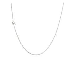 A favorite of celebrity style icons, Maya Brenner has become famous for her distinctive personalized pieces, designed at her studio in Los Angeles. This delicate necklace makes your mark with a single sans serif initial, set slightly off to the side, on a super fine cable chain in 14k gold or sterling silver.    Initial: 1/4 "; Chain: 16"  Solid 14k gold.  Sterling silver; Imported. Everyday Sterling Silver Initial Necklace With Delicate Chain, Sterling Silver Initial Pendant Necklace With Delicate Chain, Sterling Silver Initial Necklace With Delicate Chain, Classic Silver Initial Necklace With Delicate Chain, Dainty Sterling Silver Initial Necklace With Cable Chain, Classic Sterling Silver Initial Necklace With Delicate Chain, Classic Sterling Silver Initial Necklace, Classic Sterling Silver Initial Necklace With Adjustable Chain, Minimalist Sterling Silver Initial Pendant Name Necklace