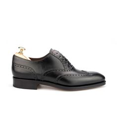 WINGTIP OXFORDS IN BLACK CALF Timeless Oxfords With Rubber Sole, Timeless Brogue Oxford With Round Toe, Timeless Oxford Shoes With Brogue Detailing And Round Toe, Timeless Round Toe Oxford For Derby, Timeless Oxford Shoes With Leather Sole And Round Toe, Timeless Oxfords With Round Toe And Rubber Sole, Long Black Socks, Oxford Brogues, Exclusive Shoes